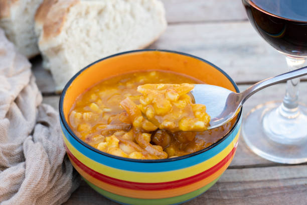 Food based on vegetables, meat and cold cuts typical of Argentina. Locro is a traditional meal in Latin America. Locro is a traditional Argentine food that is made with vegetables, meats and sausages. pachystachys lutea stock pictures, royalty-free photos & images