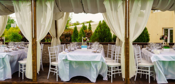 istock Set table at a wedding banquet in the park. 1320340342
