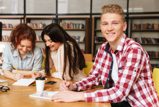 istock Group of cheerful teenagers 1320344730