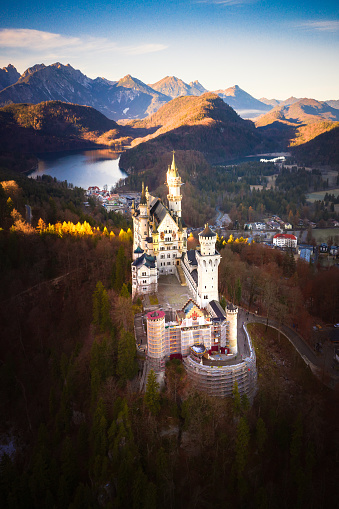 Aerial view of Neuschwanstein Castle with scenic Alps mountains near Fussen, Bavaria, Germany