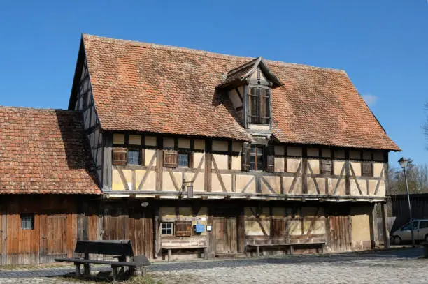 View of a typical Franconian building with a timber-framed / half-timbered facade ("Fachwerk") in the old town of Bad Windsheim in Fraconia, Germany