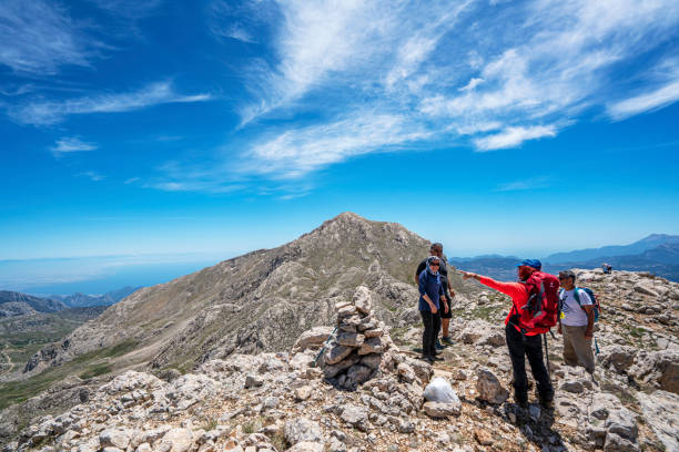 the kartal mountain and  Saklı Summit in Antalya Konyaaltı, Antalya, Turkey-May 19, 2021: people are enjoying the trekking and the summit of the kartal mountain and  Saklı Summit in Antalya kartal stock pictures, royalty-free photos & images