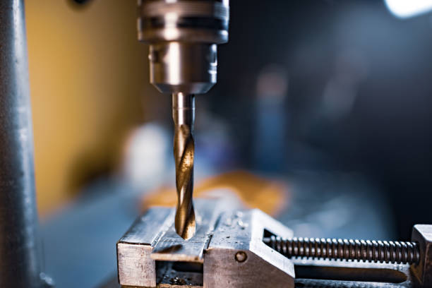 istock Drilling process with shavings close-up at the workplace in workshop 1320351855