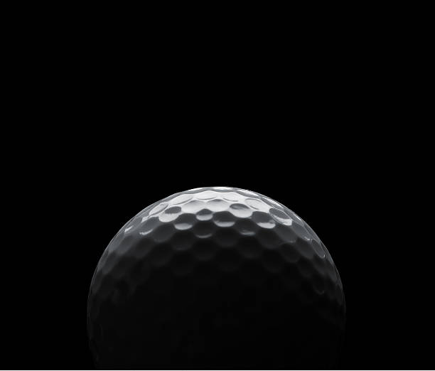 Golf ball silhouette on black background with copy space