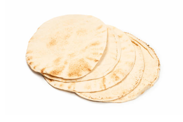istock Grilled pitta bread isolated on white background. 1320355748