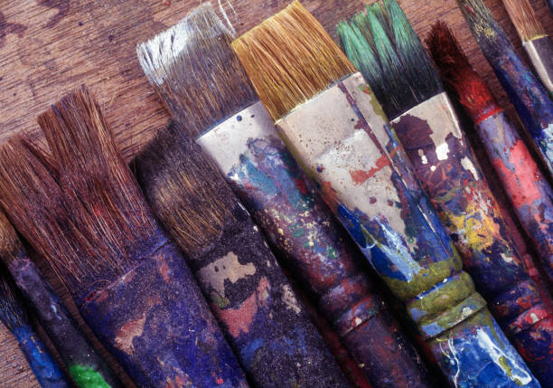istock Artist brushes in art studio, close-up 1320356207