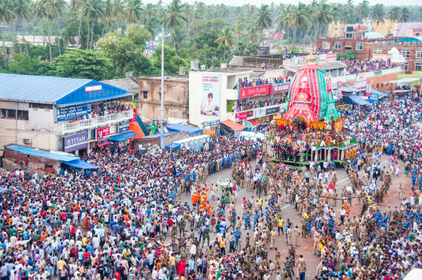 ratha yatra puri odisha india puri odisha india on july 26th 2015:The picture shows an aerial view of Grand Road in Puri city. The picture was taken during the ratha yatra procession. Every year Jagannath Dev's Rath Yatra is held in Puri. Puri Rathyatra is world famous. During the Rath Yatra, devotees from all over the world flock to Puri.Devotees wait at Puri's Grand Road to participate in Jagannath Dev's Rath Yatra. odisha stock pictures, royalty-free photos & images
