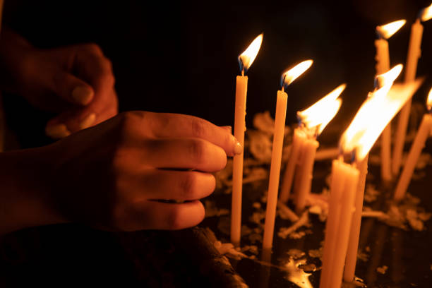 istock light candles in the church 1320370605