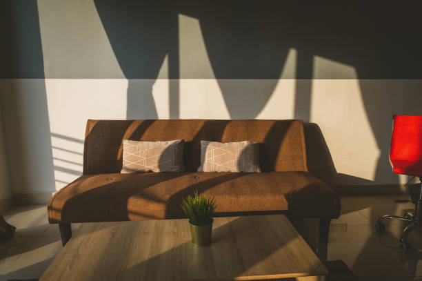 istock Sofa Furniture in house background with light shade on object 1320374952
