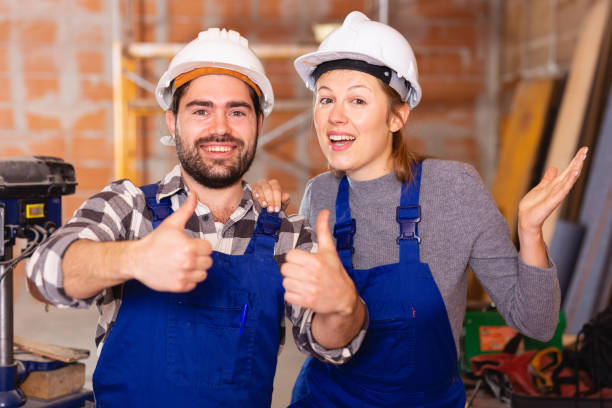 istock Two professional builders with thumbs up 1320376398