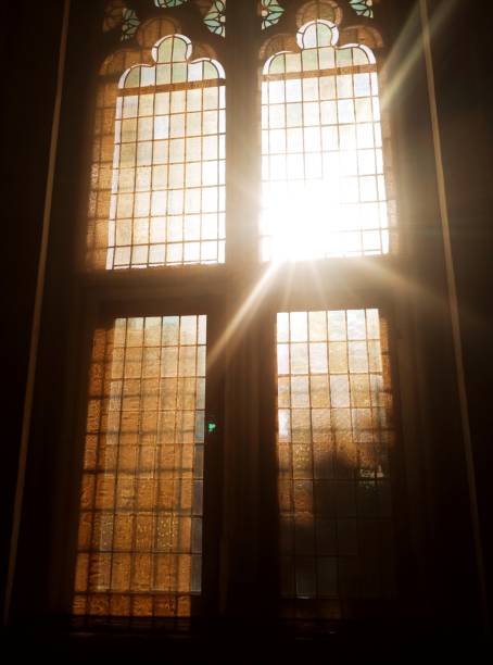 stained glass window - window sun sunlight vertical imagens e fotografias de stock