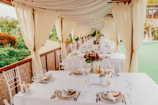 istock Set table at a wedding banquet in the park. 1320381174
