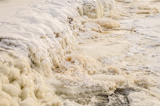 Frosty waterfall on the river Venta in Kuldiga, Latvia.