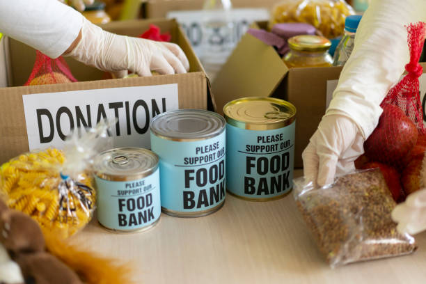 istock Donating food for poor people. Donation concept. 1320382440