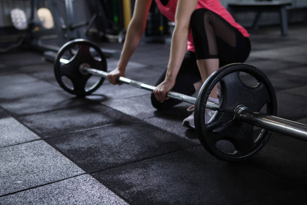 istock Sportswoman exercising at the gym 1320384443