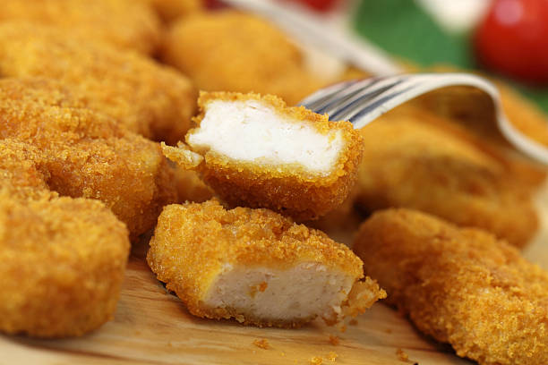 istock Pieces of golden brown chicken nuggets 132038502