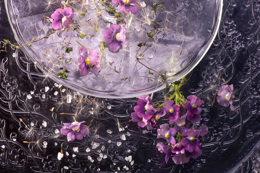 Pink flowers arranged on the openwork background