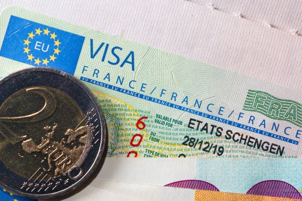 istock Schengen visa in the passport. 1320387509