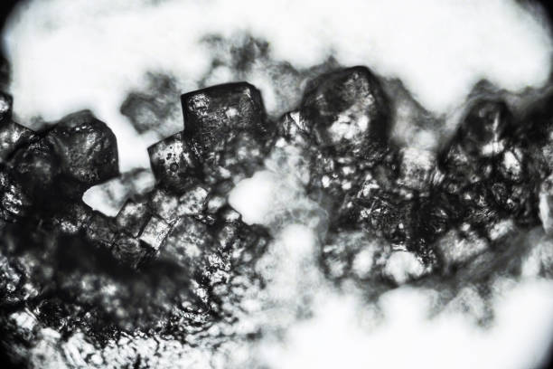 Crystal sugar close up under the light microscope, magnification of 40 times, objective 4