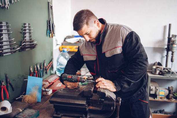 istock The service mechanic works with the tools in the workshop 1320388599