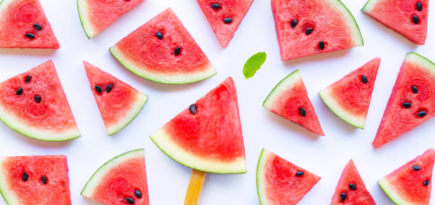 istock Sweet watermelon slices on white background 1320394386