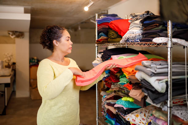 istock Woman taking fabric from a shelf 1320400807