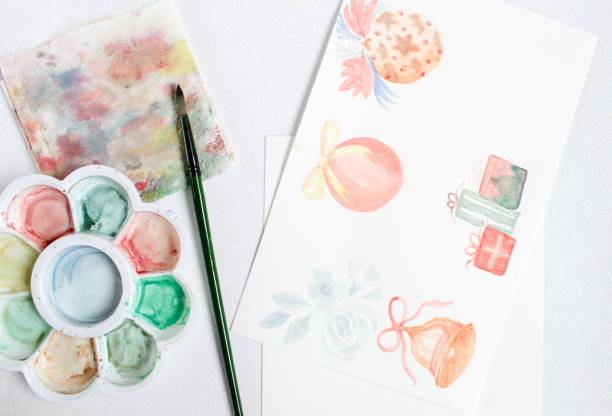 istock Watercolor paint on white paper on table for painting 1320403844