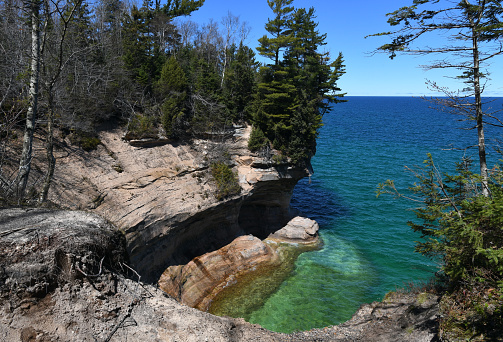 Lake Superior’s colorful cove at the Pictured Rocks National Lakeshore, near Munising, Michigan state, USA.