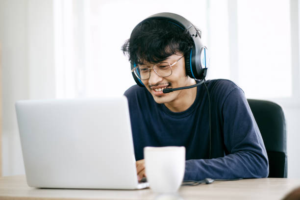 istock Service Desk Consultant Talking on hands-free phone. Call center 1320412448