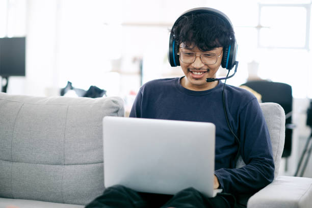 istock Service Desk Consultant Talking on hands-free phone. Call center 1320412553