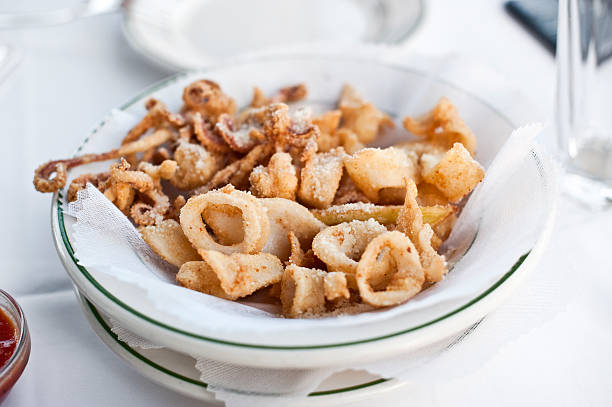 Fried calamari with shredded parmesan cheese