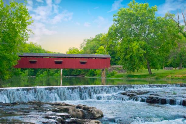 istock Waterfall-Cataract Falls-with covered bridge- On Mill Creek-Owen County Indiana 1320422146