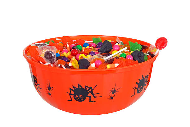 isolated bowl halloween candy isolated bowl halloween candy on white background halloween treats stock pictures, royalty-free photos & images