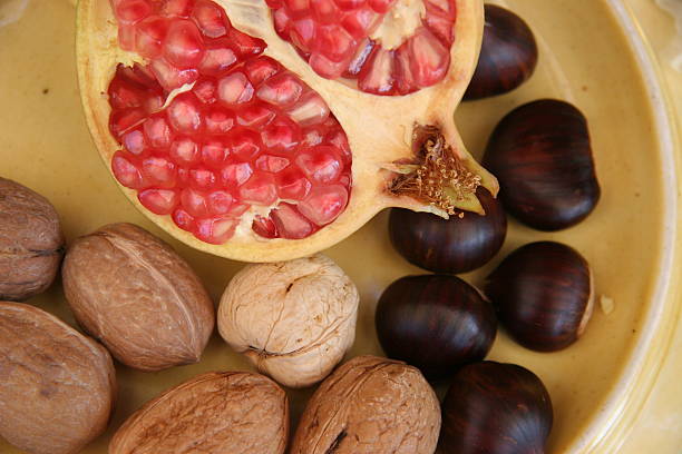 istock Close-up of Pomegranate, Walnuts and Chestnuts 132042342