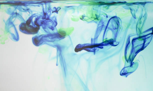 istock Drop of chemical Methylene Blue disolve in water 1320432279