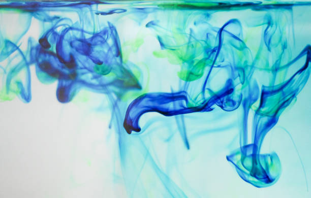 istock Drop of chemical Methylene Blue disolve in water 1320432906