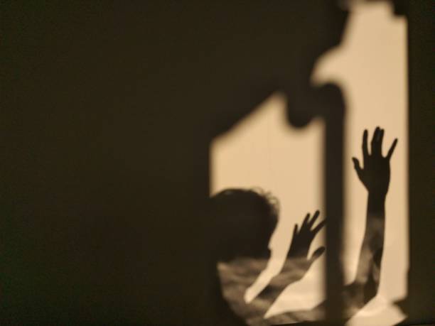 istock human shadow photo on the wall 1320433200