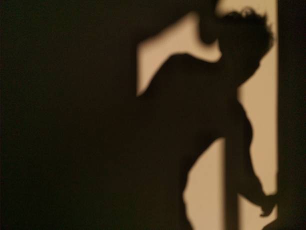 istock human shadow photo on the wall 1320433302