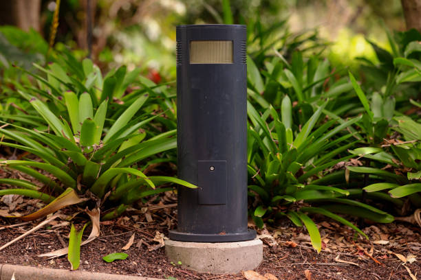 istock Lamp along a path in a public park 1320433941