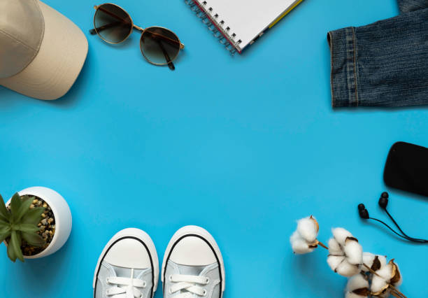 istock Stylish things for summer holidays: sneakers, sunglasses, a cap. 1320436992