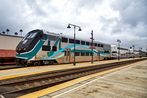 Glendale, California, USA - May 16, 2021: Los Angeles Metrolink train departure from Glendale Station.