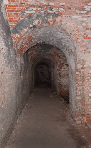 istock A brick basement passage in an old fort. 1320437763