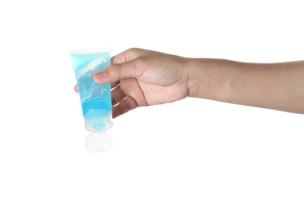 istock woman using antibacterial hand sanitizer spray isolated on white background 1320443707