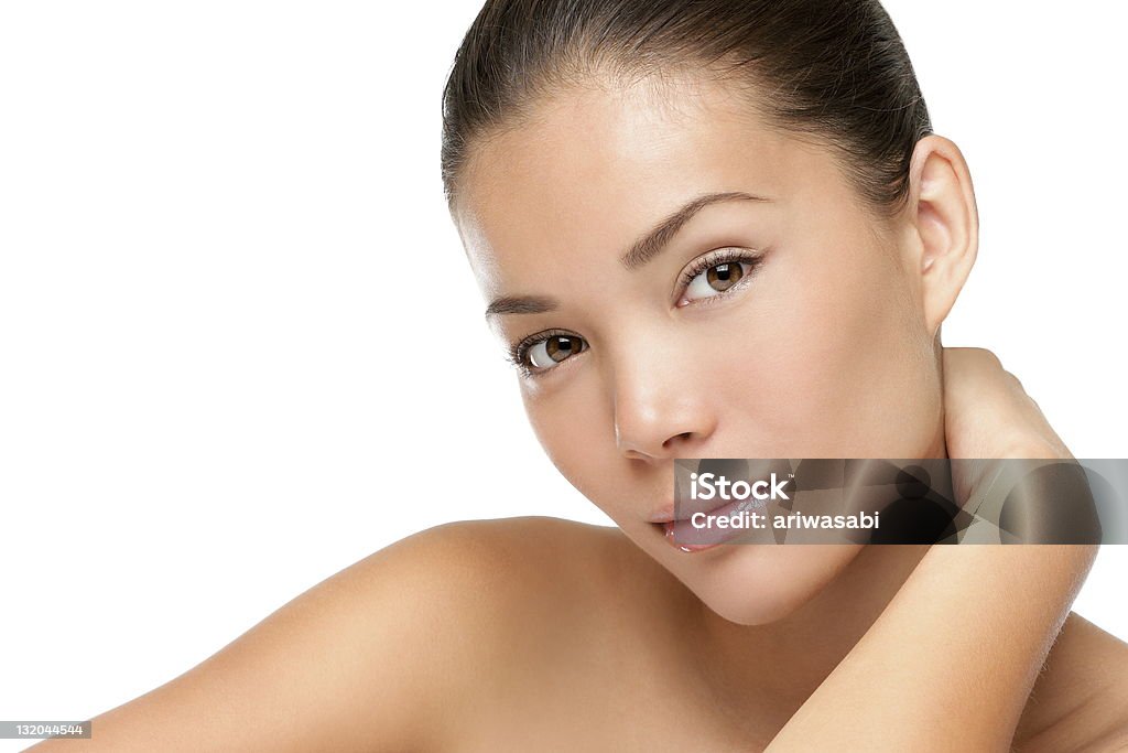 Asian woman beauty face Asian woman beauty face closeup portrait. Beautiful attractive mixed race Chinese Asian / Caucasian female model with perfect skin isolated on white background. More pictures: Women Stock Photo