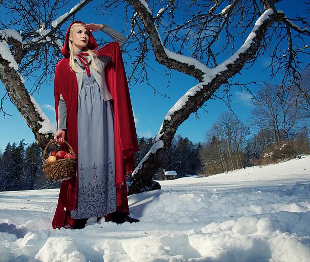 istock Red Hood with a basket of apples 132044562