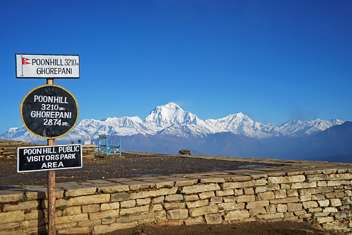 Natural landscape of snowcapped hill range with cloudy blue sky- Nepal