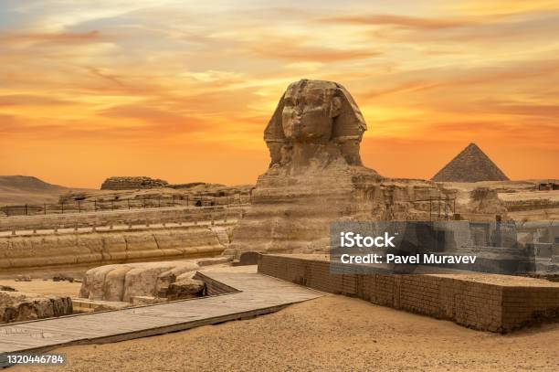 Landscape With Egyptian Pyramids Great Sphinx And Silhouettes Ancient Symbols And Landmarks Of Egypt For Your Travel Concept To Africa In Golden Sunlight Stock Photo - Download Image Now