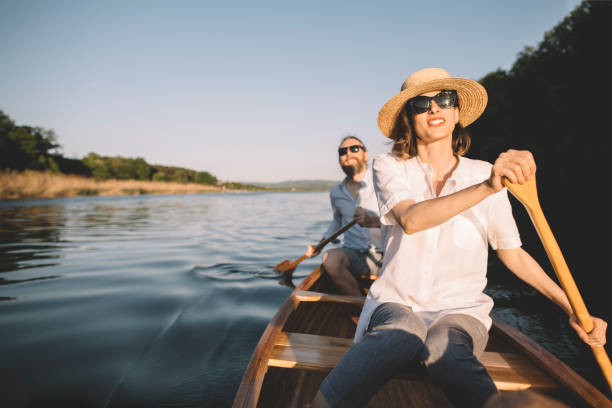 istock Couple enjoying a canoe ride 1320447739