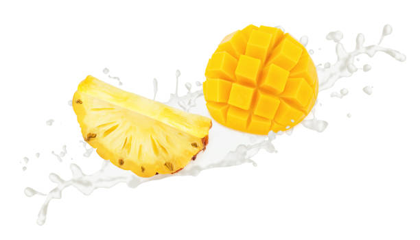 istock Cutted pineapple with mango in milk splashes isolated on white background. 1320450390