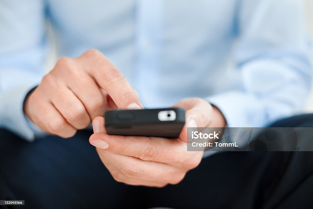 Hombre con teléfono inteligente - Foto de stock de Adulto libre de derechos